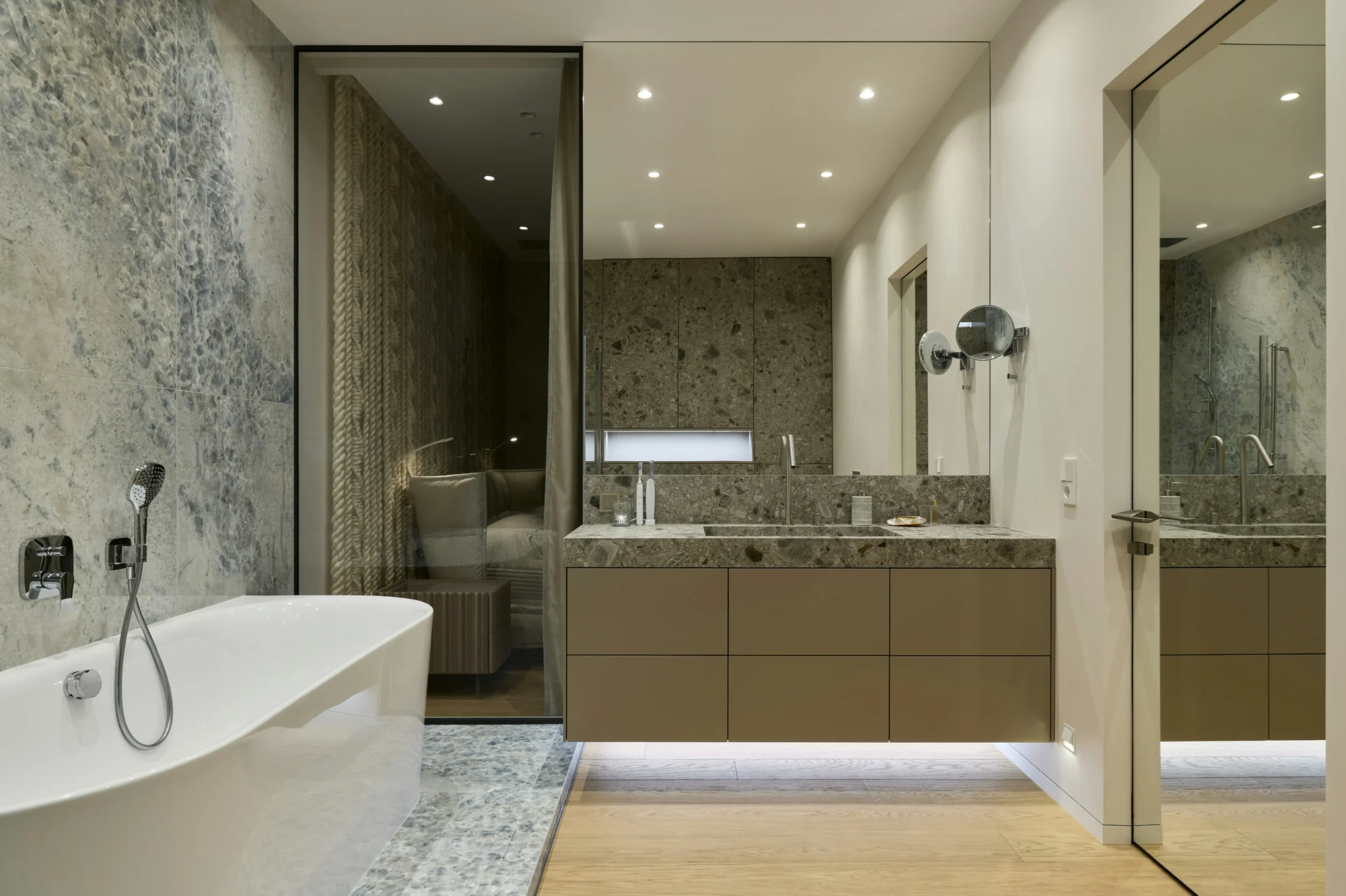 Floating vanity modern spa bathroom with natural stone finishes