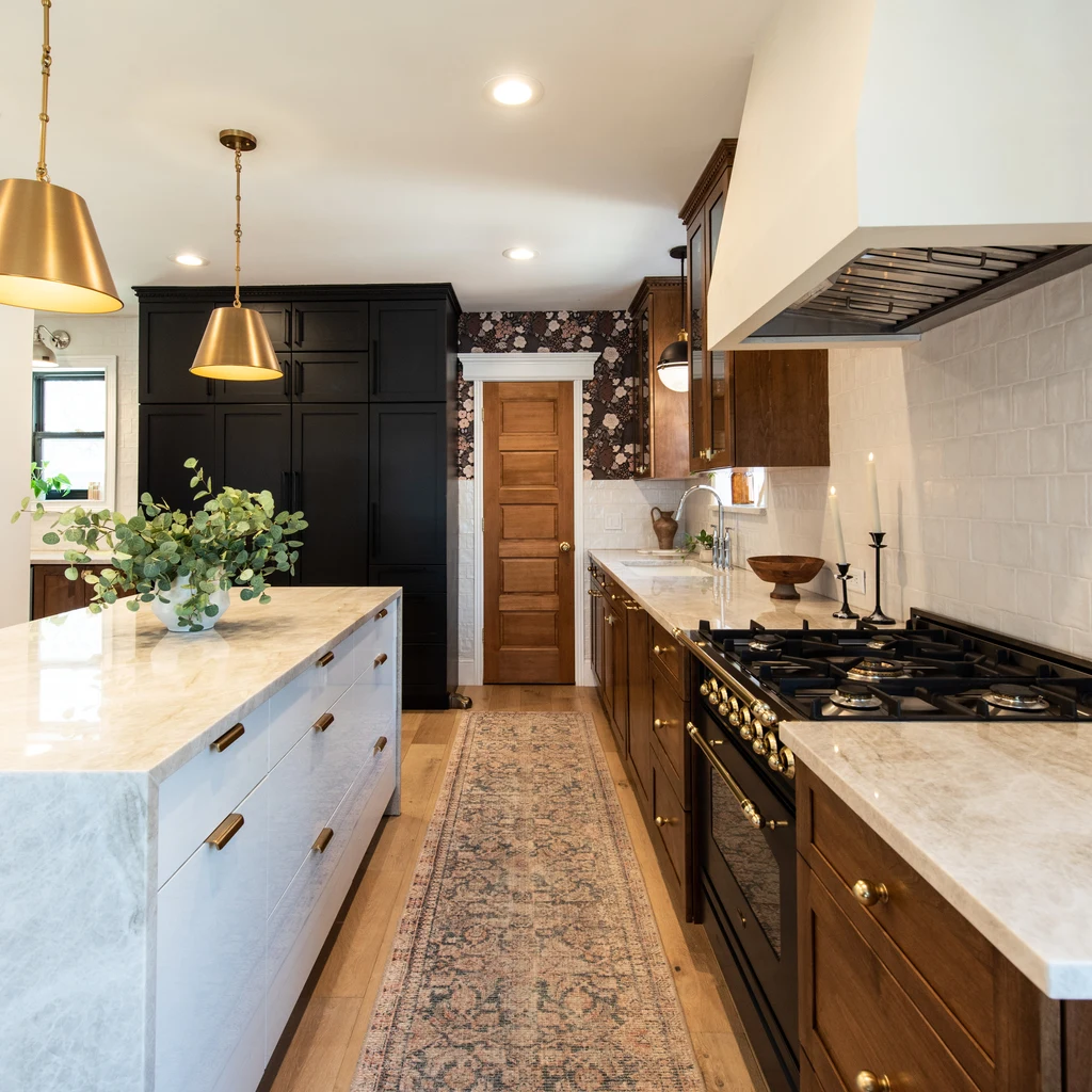 The Best Kitchen Storage Ideas for Denver Homeowners in 2026 10 black brass kitchen marble island gas range
