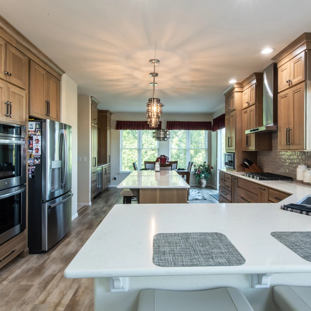 The Best Kitchen Storage Ideas for Denver Homeowners in 2026 12 honey oak kitchen large island quartz countertop