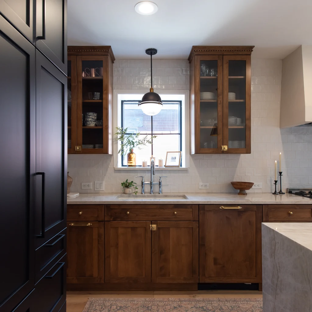 The Best Kitchen Storage Ideas for Denver Homeowners in 2026 2 walnut kitchen black cabinets glass front uppers