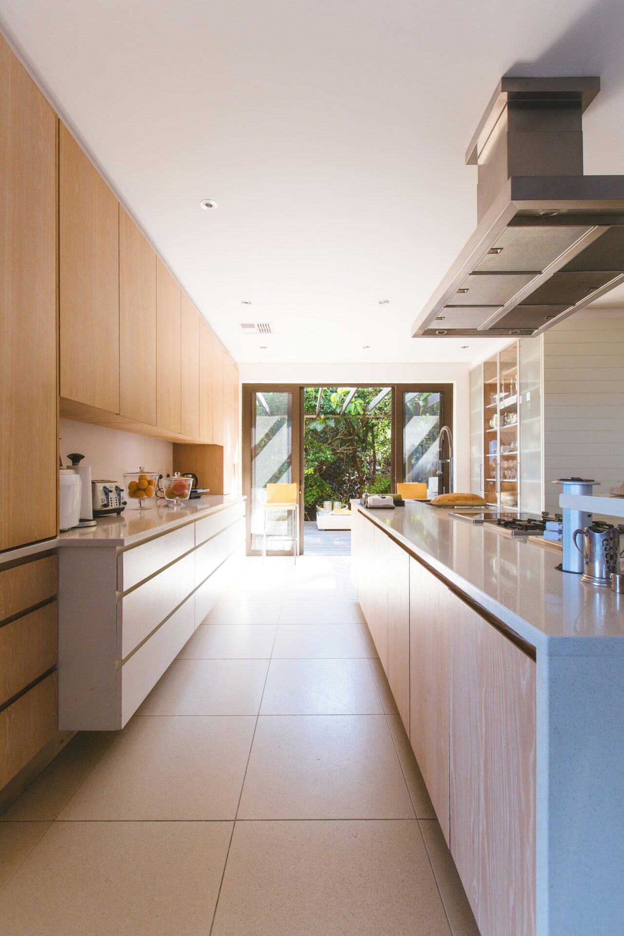 Your Denver Kitchen Remodel Guide: Custom Work, Fast Timelines, and a Kitchen You Will Actually Love 3 Denver kitchen remodel featuring natural wood cabinetry, quartz countertops, large island, and contemporary design.