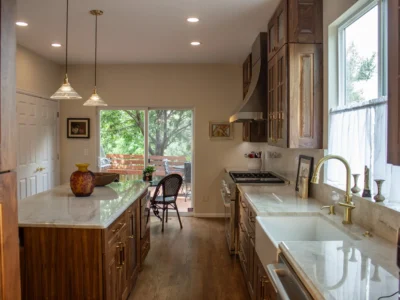 Burnished Grain Kitchen 9 Burnished Grain Kitchen remodel overview with walnut island, farmhouse sink, and pendant lights