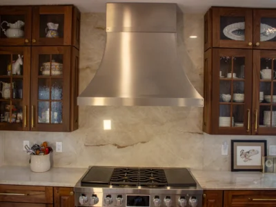 Burnished Grain Kitchen 7 kitchen-stainless-range-hood-walnut-cabinets-marble-slab-backsplash