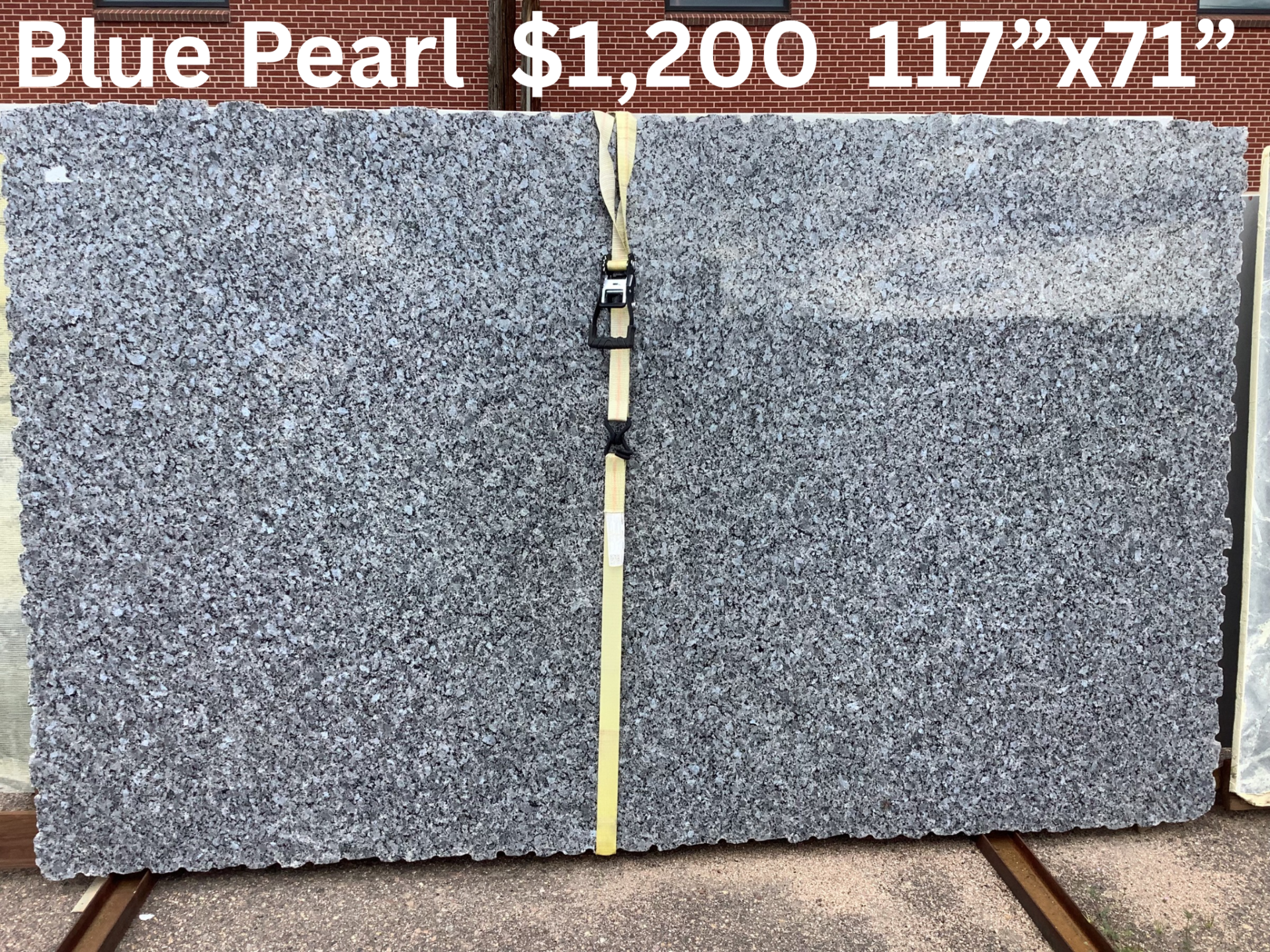 Porcelain Countertops Denver Homeowners Are Falling For: The Low-Maintenance Trend for Indoor and Outdoor Kitchens 3 Blue Pearl granite slab measuring 117 by 71 inches with gray, black, and blue mineral patterning