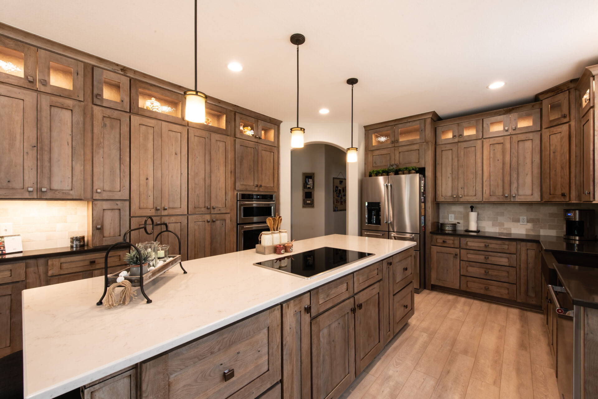 Porcelain Countertops Denver Homeowners Are Falling For: The Low-Maintenance Trend for Indoor and Outdoor Kitchens 2 Rustic kitchen remodel featuring the porcelain countertops Denver homeowners love, with walnut cabinets and a butcher block island